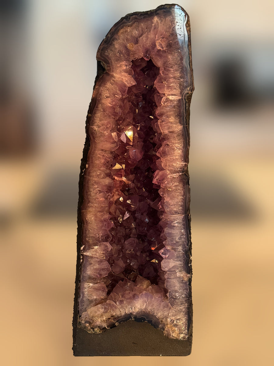 Large amethyst cathedral geode 14.4kg with deep violet crystal chamber, front view