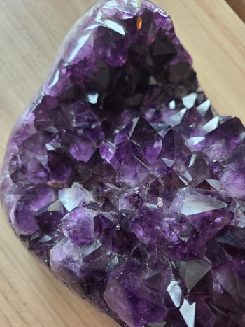 Deep purple amethyst crystal points inside a 20.2kg statement geode