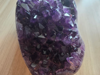 Geode cavity lined with sharp purple amethyst points from Brazil