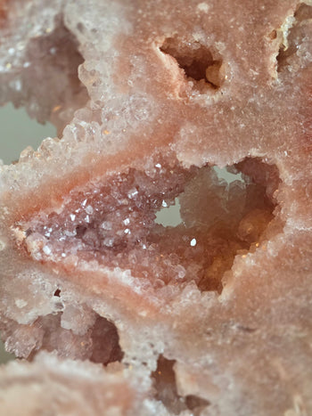 Glittering lavender and pink amethyst druzy close-up