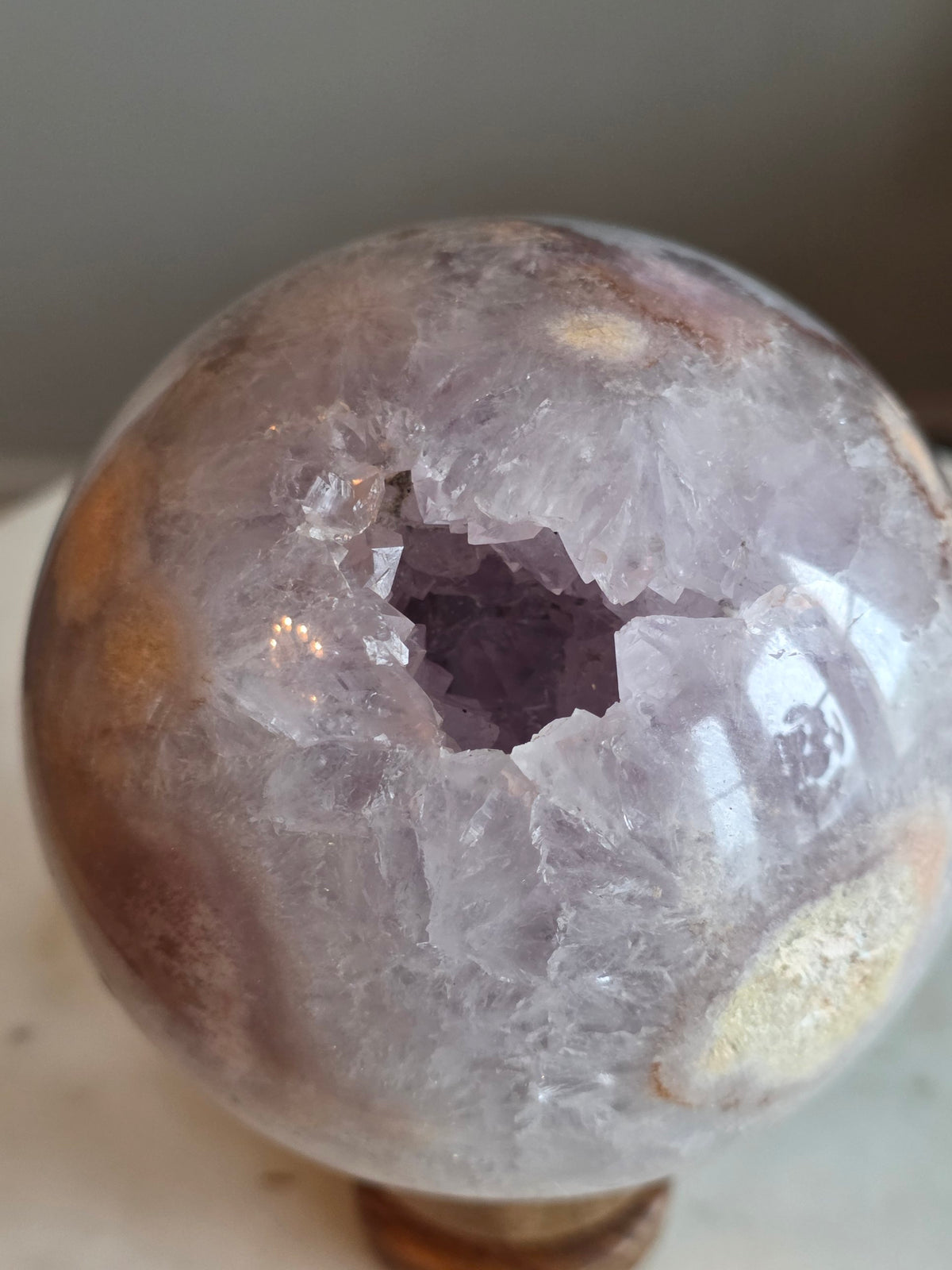 Lavender amethyst geode sphere 1.18kg, 9.9cm, from Brazil – front view with crystal cavity