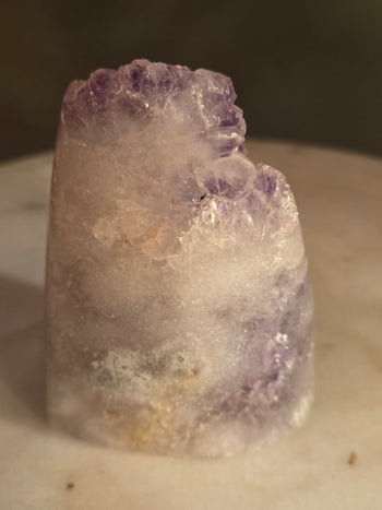 Back of 288g amethyst cut-base freeform showing amethyst points along the edge