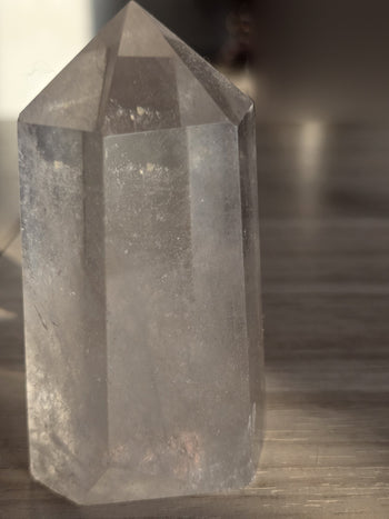 Natural inclusions inside a clear quartz point, close view