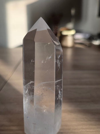 Close-up of natural veils and inclusions inside a clear quartz tower
