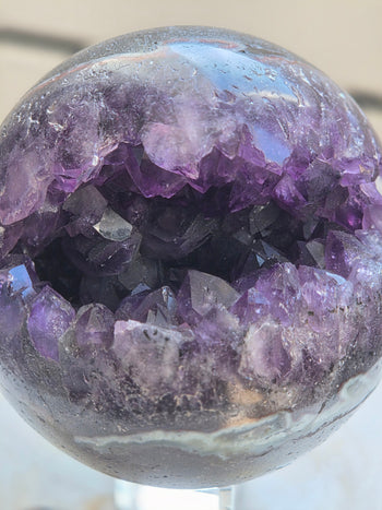 Amethyst crystal ball with geode opening, 925g, Brazil, further view