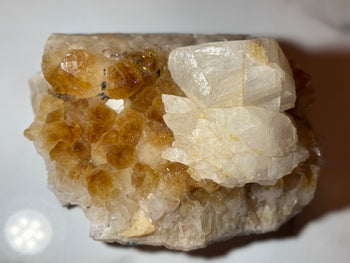 Citrine cluster with calcite 1.99kg, golden amber points beside white calcite, side view