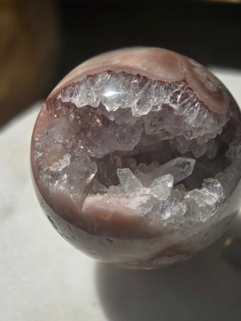 Pink amethyst geode sphere 1111g, polished pink surface