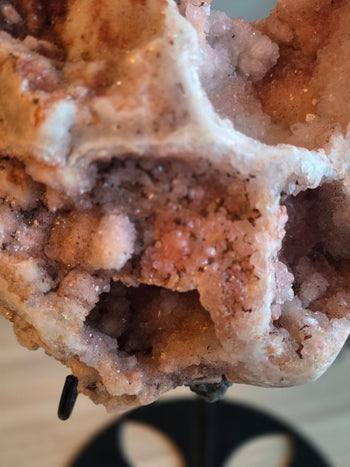 See-through crystal window arch in a pink amethyst geode