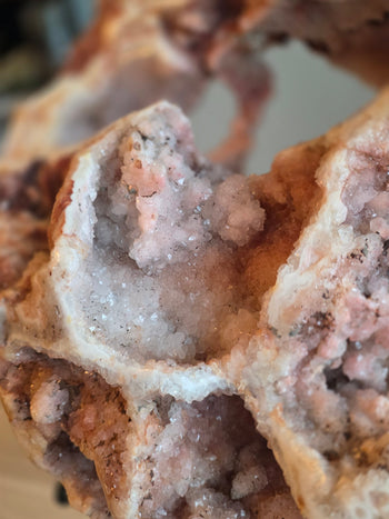 Frosted white quartz pocket framed by pink chalcedony
